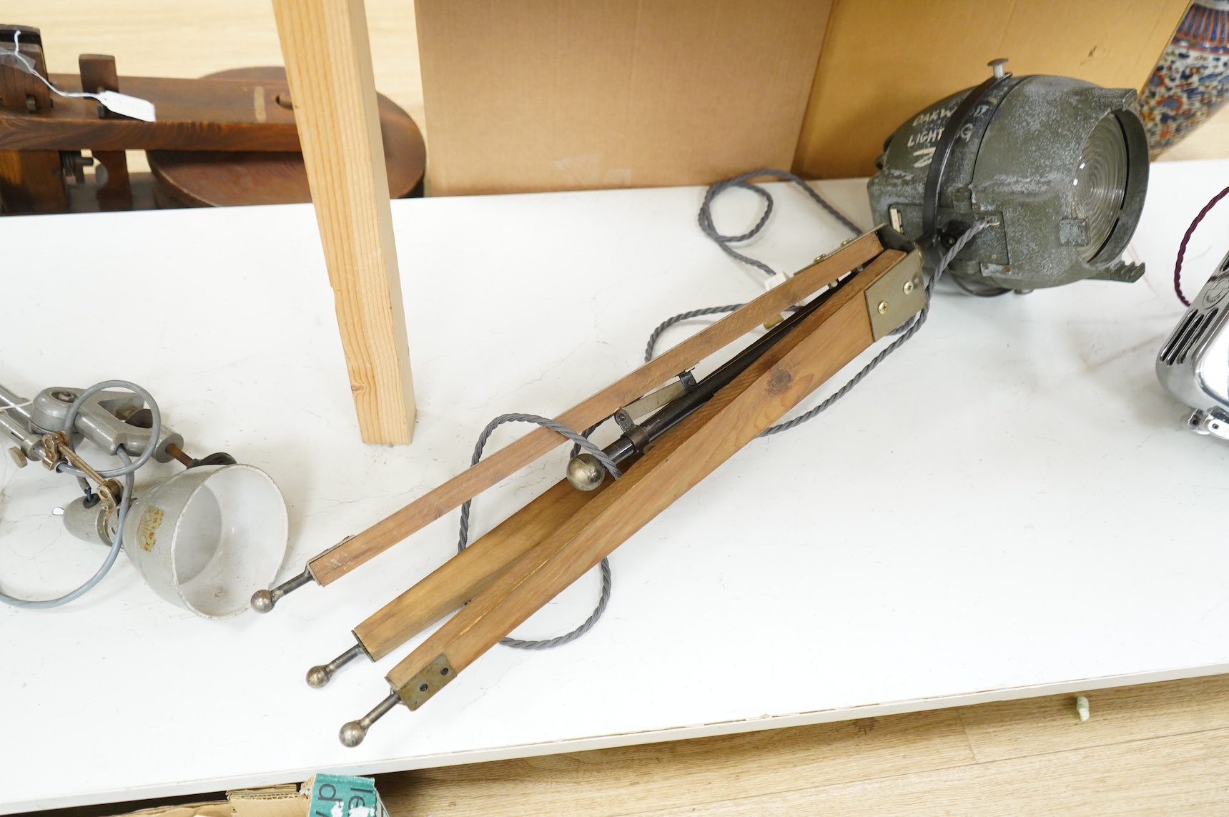 A vintage strand electric theatre lamp on tripod base, 89cm high